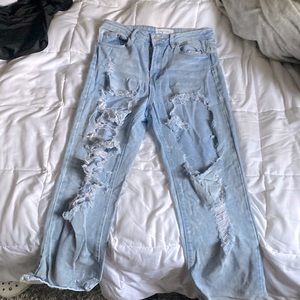 Over sized ripped jeans